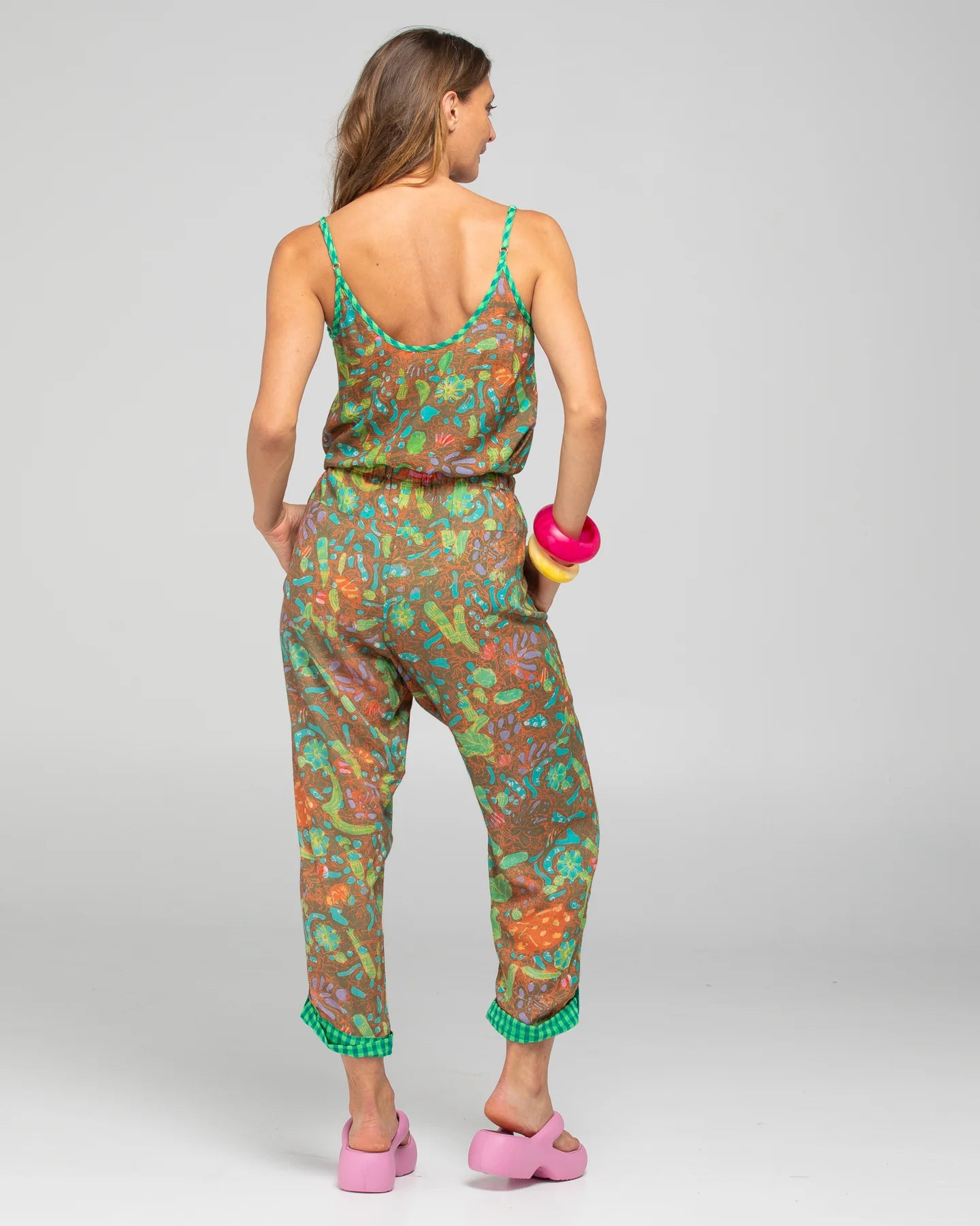 Boom Shankar Rimi Pant in vibrant Rimini print, featuring a contrast Verde waist tie, elasticated gathered waistband, side pockets, and cuffed hems with button and tab detailing.