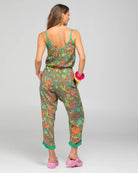 Boom Shankar Rimi Pant in vibrant Rimini print, featuring a contrast Verde waist tie, elasticated gathered waistband, side pockets, and cuffed hems with button and tab detailing.