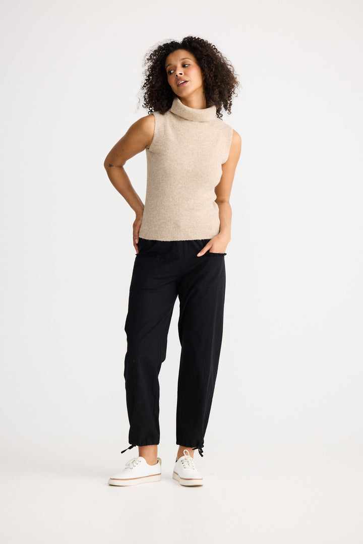 Lucerne Knit Top in oatmeal featuring a high rolled neckline, sleeveless fitted silhouette, rib knit texture and soft fuzzy finish.