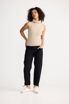 Lucerne Knit Top in oatmeal featuring a high rolled neckline, sleeveless fitted silhouette, rib knit texture and soft fuzzy finish.