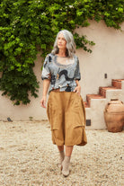 Milwaukee Textured Skirt Mustard by Olga De Polga is currently available from Rawspice Boutique, South West Rocks. 