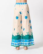 Vermont Pant in Andiamo with a wide-leg silhouette, elastic waistband, side seam pockets, and an exclusive Walnut Melbourne print in 100% cotton.
