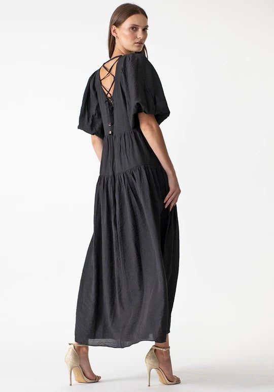 Your Sonnet Tie Back Maxi by Three Of Something is available at Rawspice Boutique.