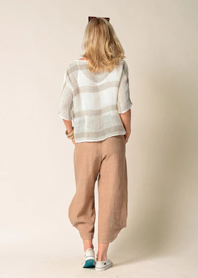 The Addison Linen Pant in Desert. Breathable linen trousers with a tie waist and side pockets, styled for relaxed, everyday elegance.