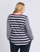 All Sorts Long Sleeve Top in Midnight/White with yarn-dyed stripes, an oversized fit, crew neckline and side splits.
