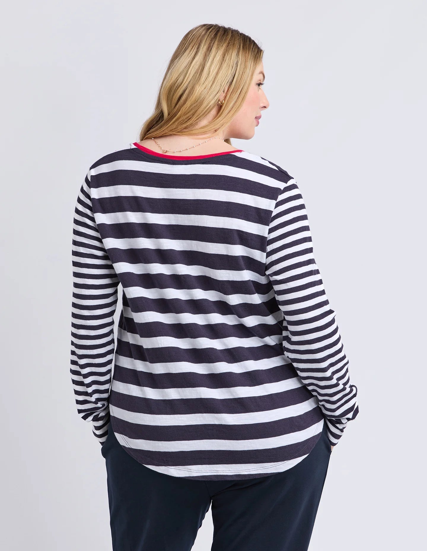 All Sorts Long Sleeve Top in Midnight/White with yarn-dyed stripes, an oversized fit, crew neckline and side splits.
