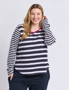 All Sorts Long Sleeve Top in Midnight/White with yarn-dyed stripes, an oversized fit, crew neckline and side splits.
