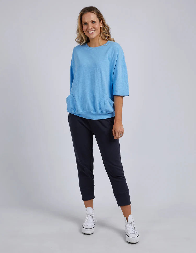 The Azure Blue Fundamental Mazie Sweat by Elm is available at Rawspice Boutique.