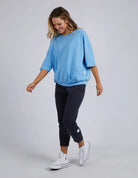 The Azure Blue Fundamental Mazie Sweat by Elm is available at Rawspice Boutique.