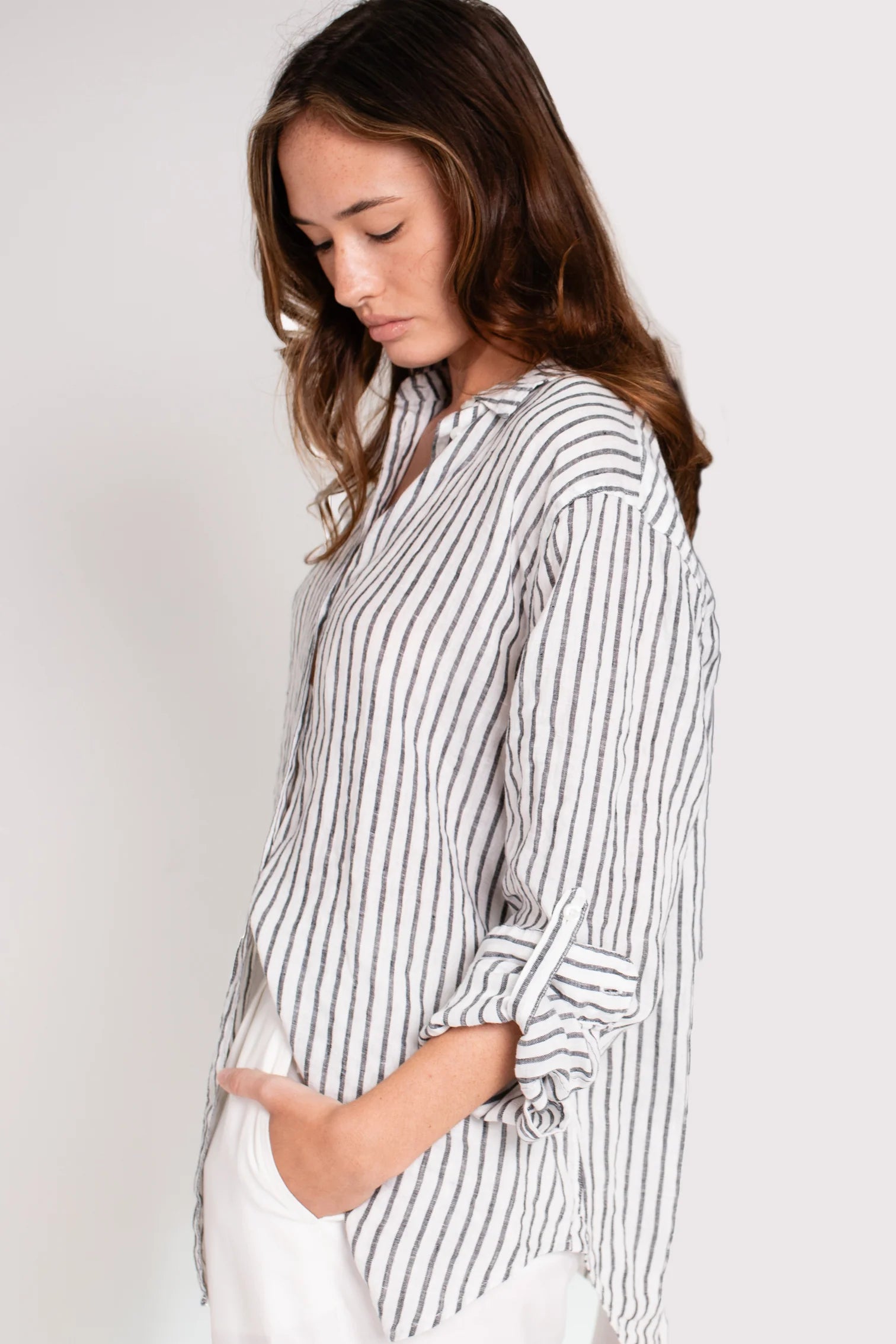 Boyfriend Linen Shirt - Black Yarn Dye Stripe, oversized fit, 100% Organic Belgian Linen, soft-washed for comfort. A breathable, timeless travel shirt.