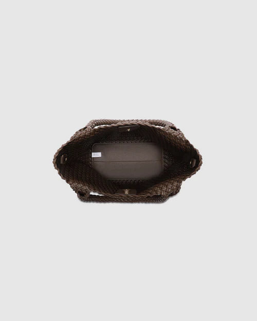 A stylish woven tote bag with top handles and an adjustable crossbody strap, perfect for effortless everyday elegance and versatility.