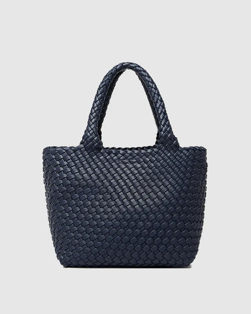 A stylish woven tote bag with top handles and an adjustable crossbody strap, perfect for effortless everyday elegance and versatility.