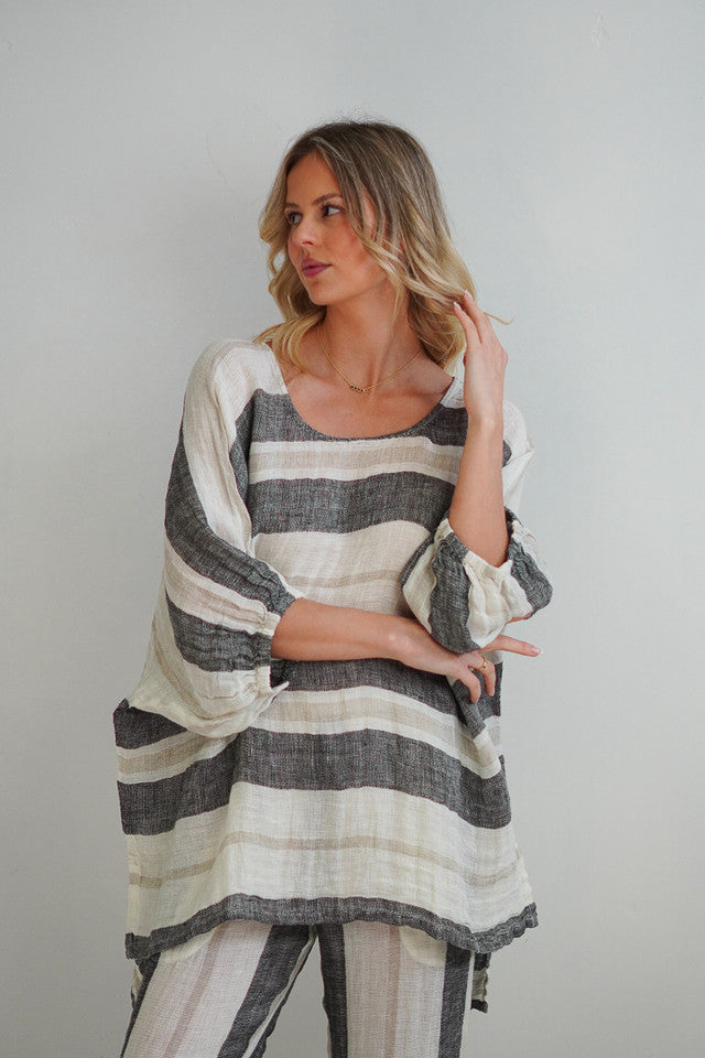 Bella Top in black stripey design, featuring a classic striped pattern, perfect for pairing with denim, linen trousers, or a structured skirt.
