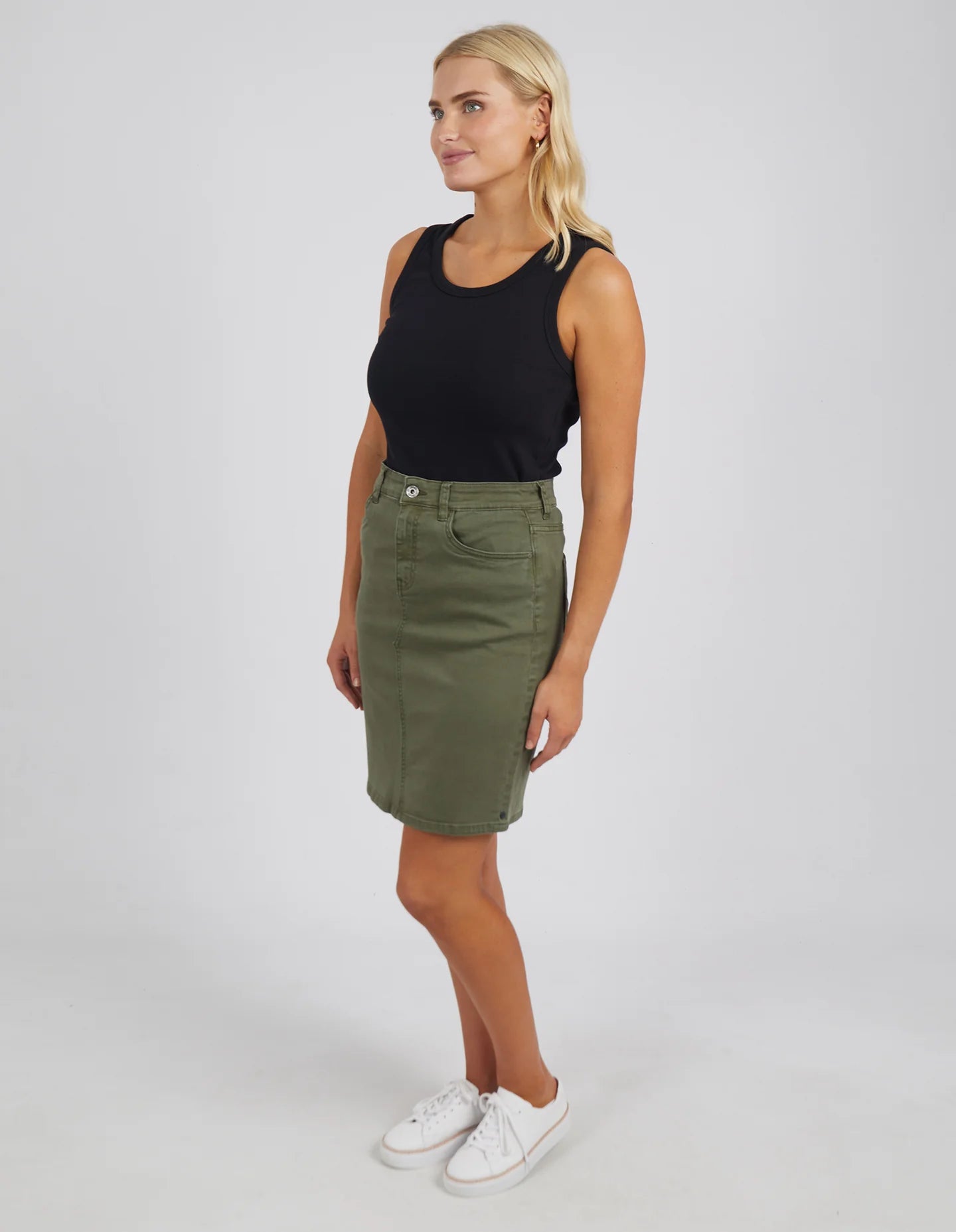 The Washed Khaki Belle Denim Skirt by Elm is available at Rawspice Boutique.