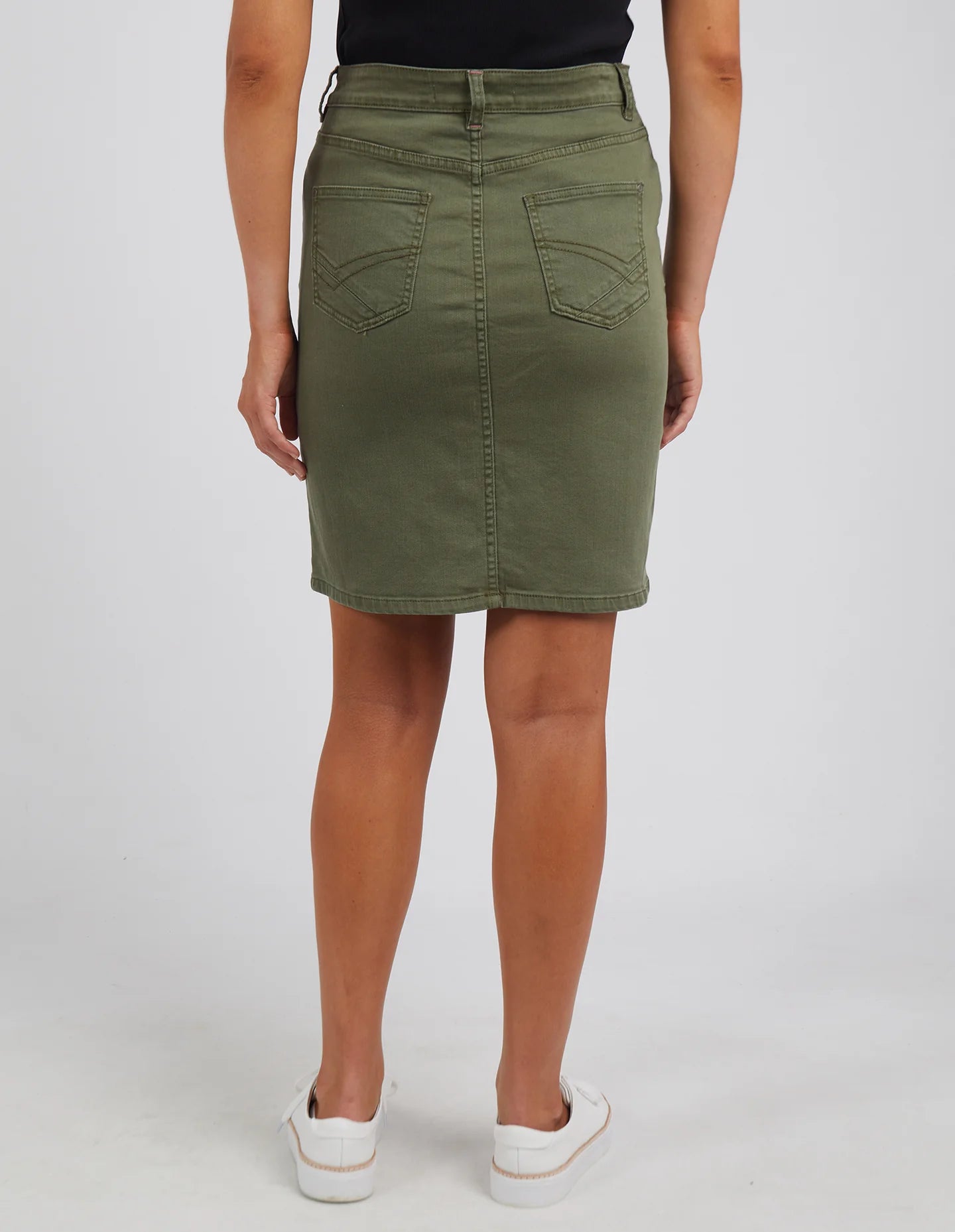 The Washed Khaki Belle Denim Skirt by Elm is available at Rawspice Boutique.