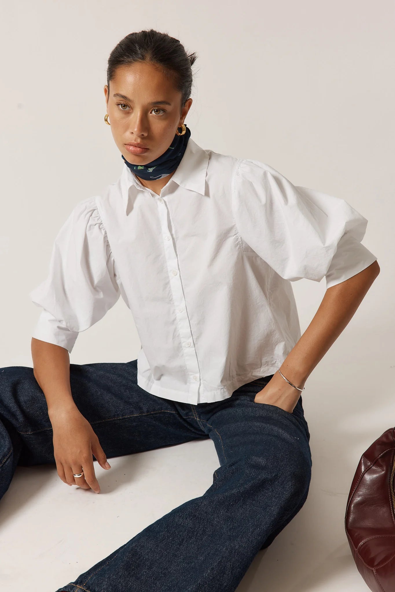 Beth Shirt in White crafted from 100% cotton, featuring short sleeves, a relaxed true-to-size fit, and a clean, versatile design for everyday wear.
