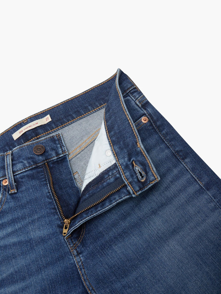  The Blue Wave Mid Women's 312 Shaping Slim Jeans by Levi's® are currently available at Rawspice Boutique.