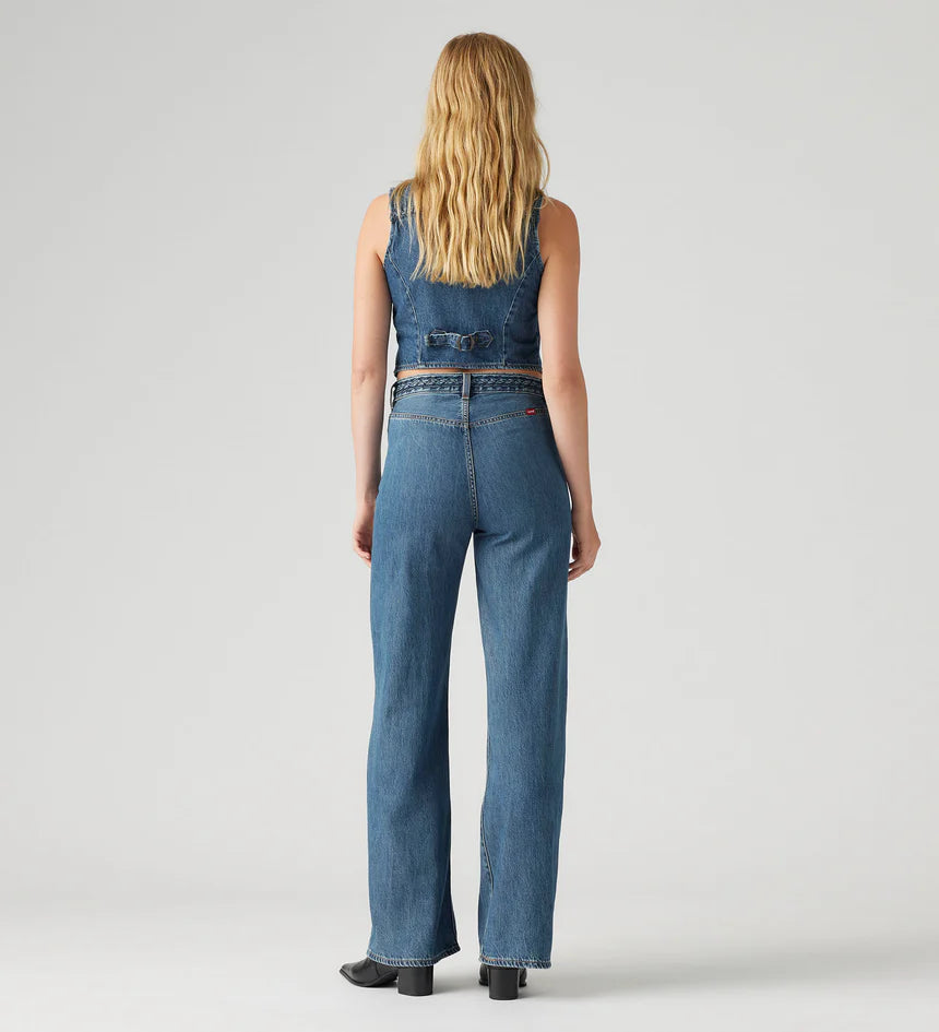 Women's Ribcage Wide Leg Braided Jeans, a high-rise, wide-leg denim with a braided waist detail, designed to define the waist and elongate the legs.