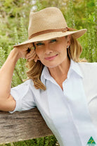 Brampton Raffia Hat in natural raffia with moldable wire brim, multi-strand leather band, and ComfyFit adjustor for a custom, secure fit.
