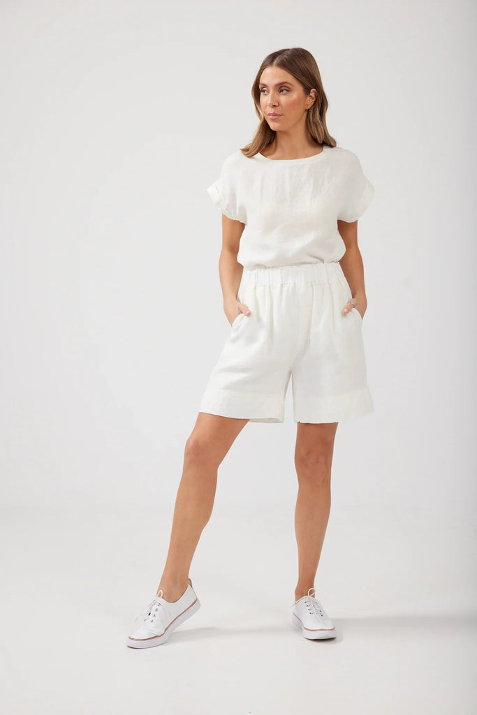 The White Broadway Shorts by Brave+True are currently available at Rawspice Boutique.