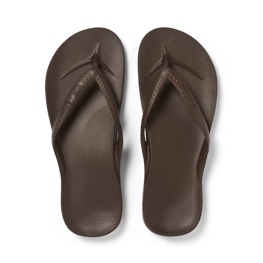 Chocolate brown arch support thongs with contoured footbeds and ergonomic straps for enhanced comfort and stability.