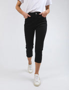 Black Mollie Capri Jeans featuring a slim, cropped leg for a flattering fit. Made from soft stretch denim with a classic 5-pocket design, calf-length cut, and Elm-stamped hardware. The comfortable button-and-fly fastening makes them a practical choice for effortless style. Crafted from 78% cotton, 20% polyester, and 2% elastane for a perfect balance of comfort and flexibility.