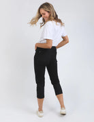 Black Mollie Capri Jeans featuring a slim, cropped leg for a flattering fit. Made from soft stretch denim with a classic 5-pocket design, calf-length cut, and Elm-stamped hardware. The comfortable button-and-fly fastening makes them a practical choice for effortless style. Crafted from 78% cotton, 20% polyester, and 2% elastane for a perfect balance of comfort and flexibility.