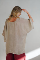 Natural Carlotta mesh linen top with wide sleeves, relaxed fit and lightweight breathable texture.