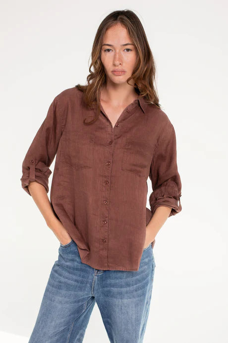 Oversized Boyfriend linen shirt in cinnamon, made from 100% organic Belgian linen, featuring a pre-washed buttersoft finish, French seams, tab sleeves, and a scoop hem for a relaxed, stylish fit.