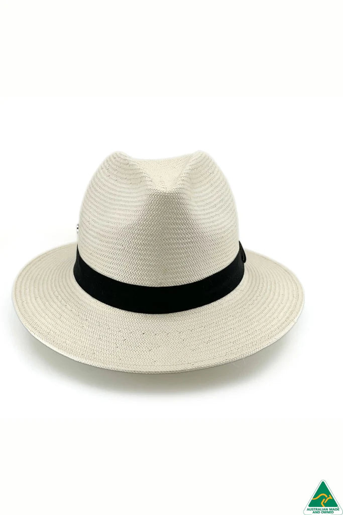 Clarence Glazed Straw Fedora in ivory with 6.5cm brim, 11cm crown, deep navy ribbon band with side detail, and ComfyFit adjustable internal band.
