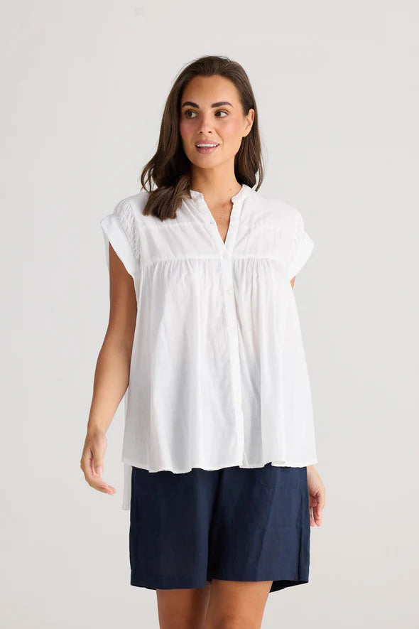 A woman modelling the Clementine Short Sleeve White Top by Holiday