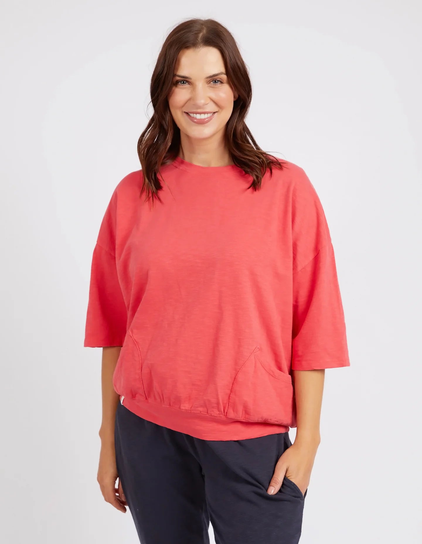 The Coral Spritz Mazie Sweat by Elm is available at Rawspice Boutique.