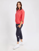 The Coral Spritz Mazie Sweat by Elm is available at Rawspice Boutique.