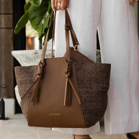 The Cocoa Cordoba Crochet Bag by Louenhide is currently available at Rawspice Boutique.