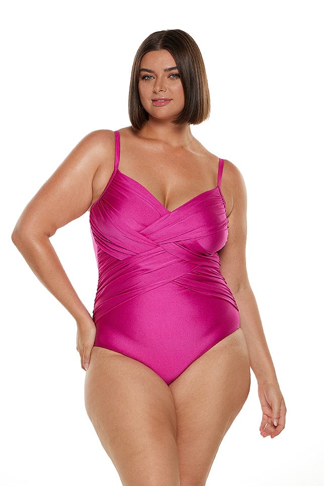 The Metallic Pink Criss Cross One Piece  by CAPRIOSCA  is available at Rawspice Boutique.