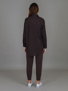 Espresso Croydon Long Sleeve Shirt featuring an oversized fit, classic collar, button front, full-length sleeves and curved hi-lo hemline.