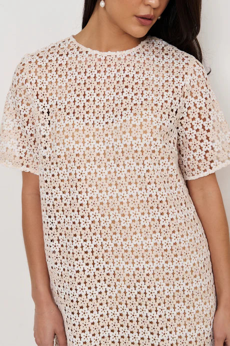 Kaia Daisy Chain A-Line Dress in Natural with daisy lace, round neckline, mid sleeves, slip lining, and button-loop back closure.