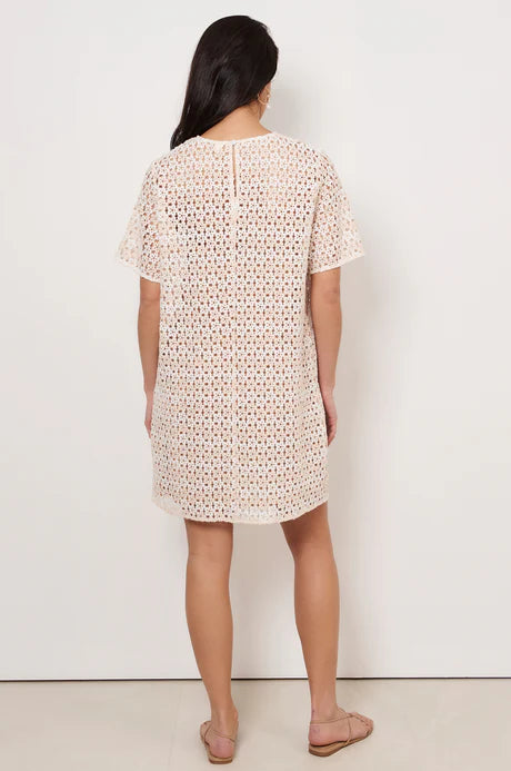 Kaia Daisy Chain A-Line Dress in Natural with daisy lace, round neckline, mid sleeves, slip lining, and button-loop back closure.