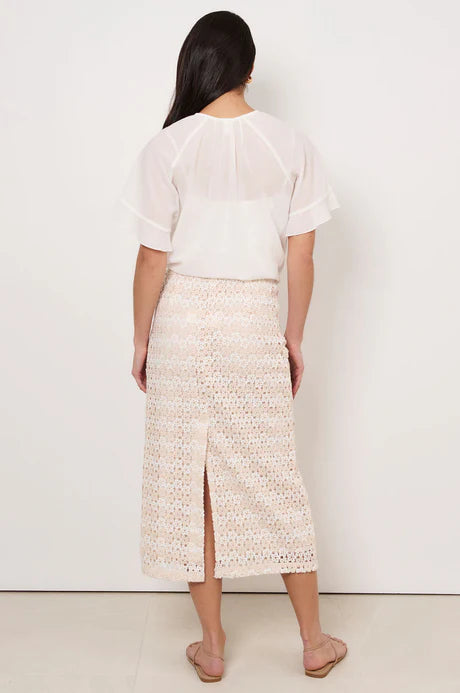 Denise Daisy Chain Skirt in Natural with daisy lace, centre-back split, elasticised waistband, and concealed side zip.