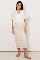 Denise Daisy Chain Skirt in Natural with daisy lace, centre-back split, elasticised waistband, and concealed side zip.