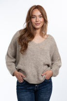 Daria Jumper with a flattering V-neck, relaxed batwing sleeves and an oversized fit, styled for effortless everyday comfort.
