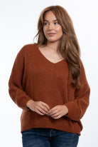 Daria Jumper with a flattering V-neck, relaxed batwing sleeves and an oversized fit, styled for effortless everyday comfort.
