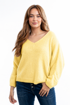 Daria Jumper with a flattering V-neck, relaxed batwing sleeves and an oversized fit, styled for effortless everyday comfort.
