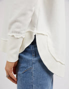 Delilah Crew jumper in Vintage White featuring a crew neckline, ribbed detailing, and a relaxed fit with a curved hem.