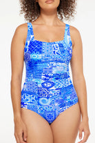 A woman close up modelling The Delta Gathered Square One Piece Swimwear With Tummy Control by TOGS