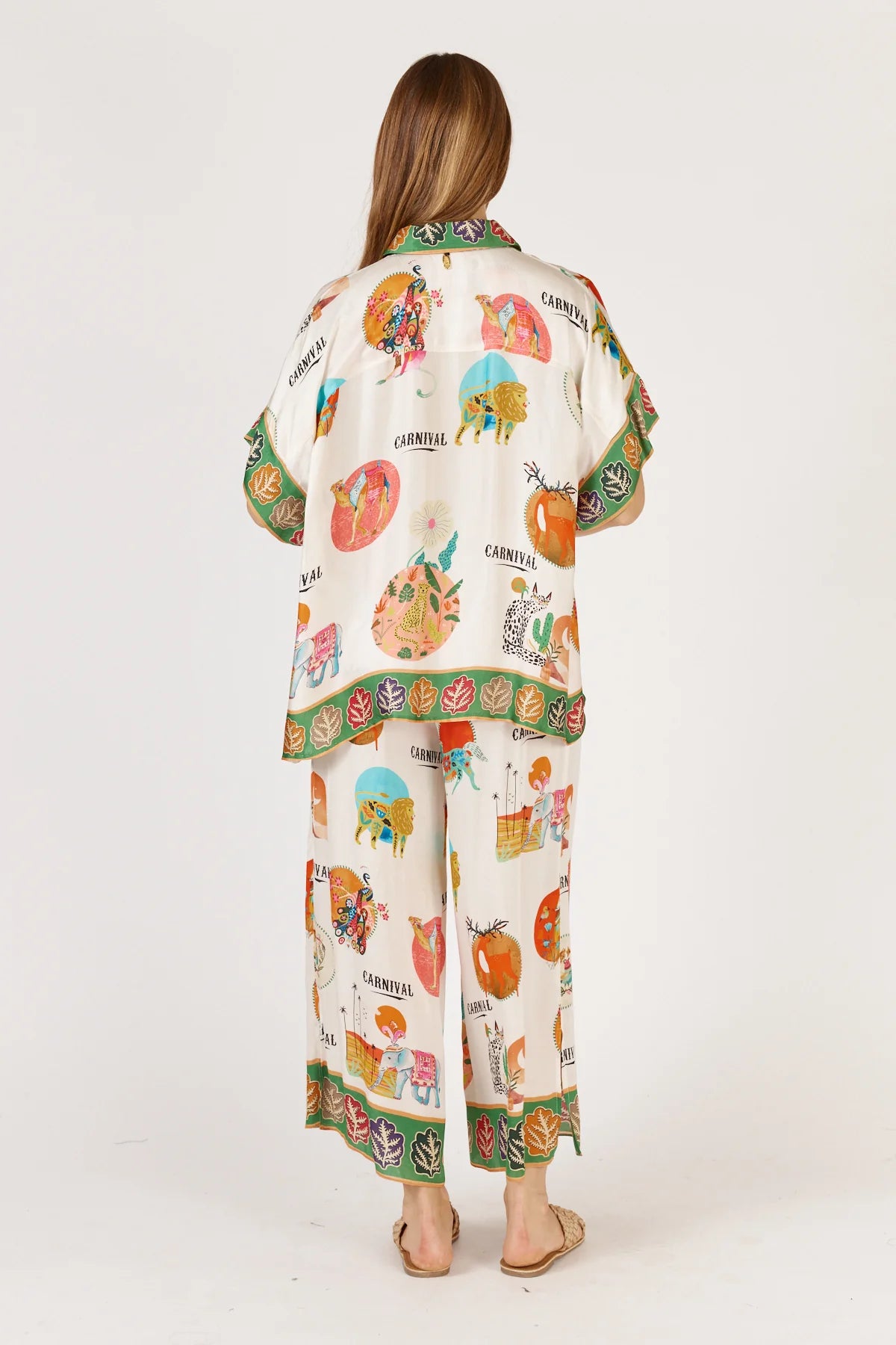 Rubyaya Down Under Pant in white, featuring a relaxed wide-leg fit, elasticated waistband, and lightweight viscose fabric with a soft, flowy drape.