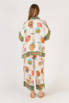 Rubyaya Down Under Pant in white, featuring a relaxed wide-leg fit, elasticated waistband, and lightweight viscose fabric with a soft, flowy drape.