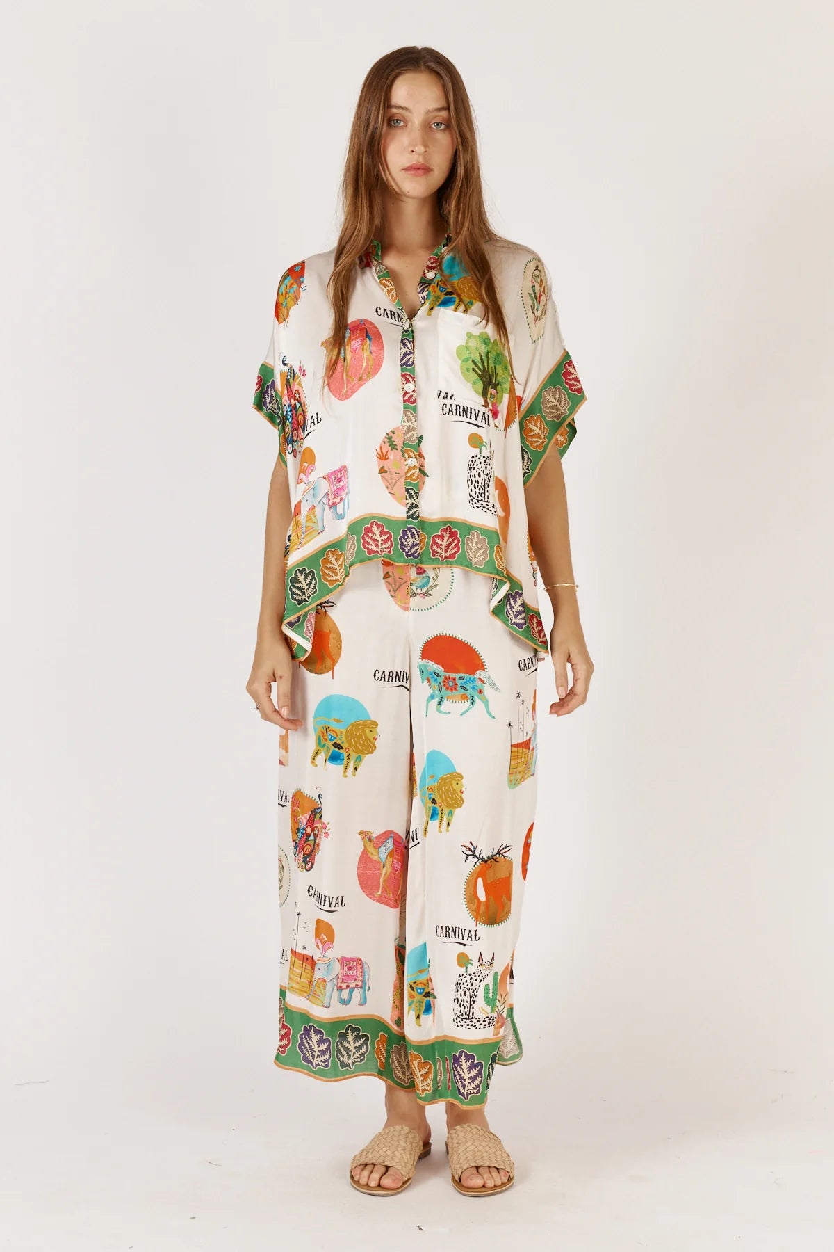 Rubyaya Down Under Pant in white, featuring a relaxed wide-leg fit, elasticated waistband, and lightweight viscose fabric with a soft, flowy drape.