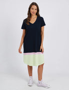 The Navy & Keylime Draw The Line Tee Dress by Elm is currently available at Rawspice Boutique. 