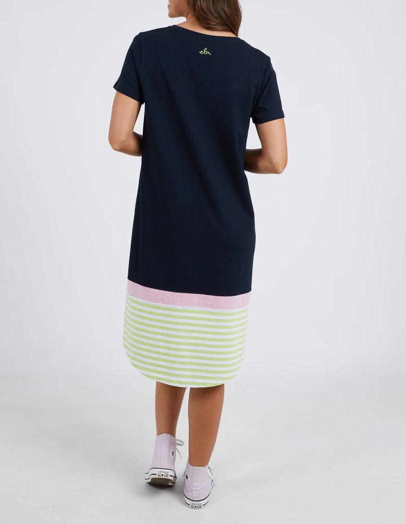 The Navy & Keylime Draw The Line Tee Dress by Elm is currently available at Rawspice Boutique. 